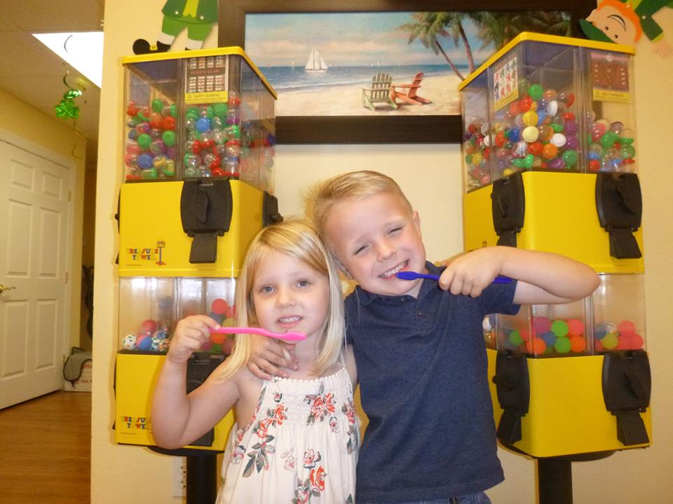 Two children at the brushing station